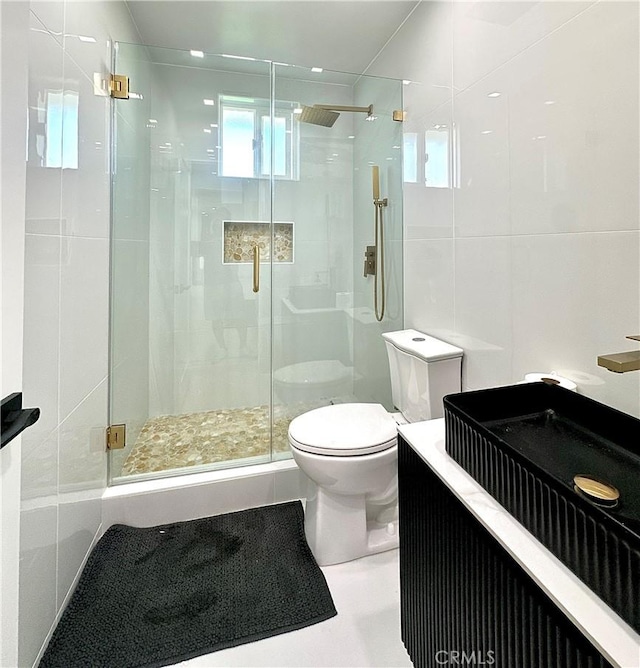 7401 Liberty Ave, Corona, CA 92881 - bathroom featuring a shower stall, healthy amount of natural light, and vanity