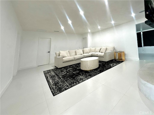 7401 Liberty Ave, Corona, CA 92881 - living room featuring baseboards