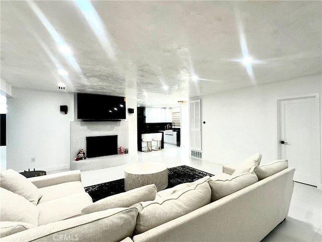 7401 Liberty Ave, Corona, CA 92881 - living area featuring a fireplace with raised hearth