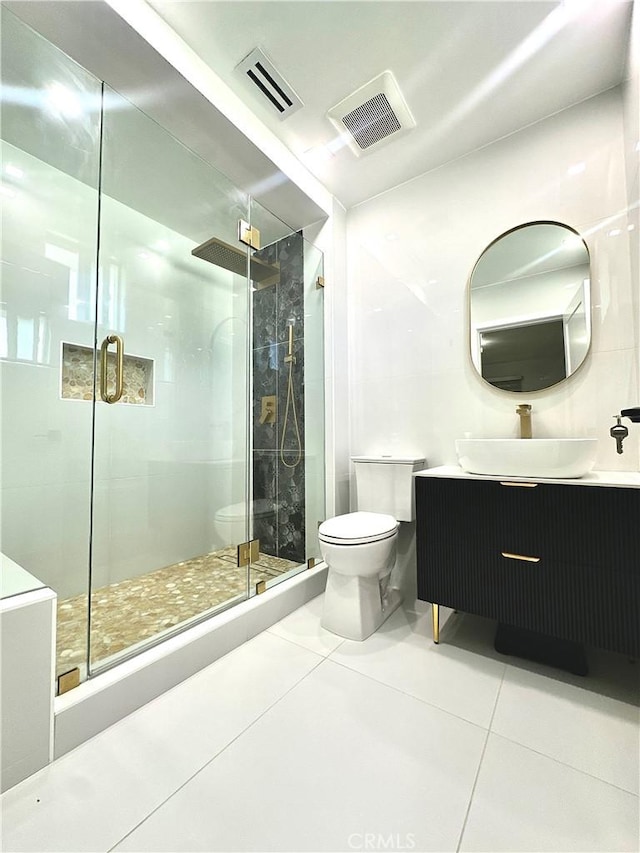 7401 Liberty Ave, Corona, CA 92881 - bathroom featuring vanity, a shower stall, and tile patterned floors