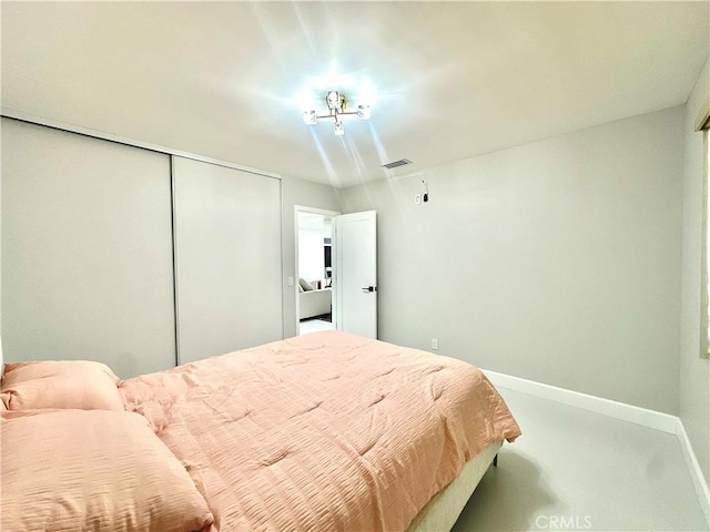 7401 Liberty Ave, Corona, CA 92881 - bedroom with baseboards and a closet