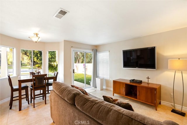 2424 Norte Vista Dr, Chino Hills, CA 91709 - living room featuring baseboards and light tile patterned floors