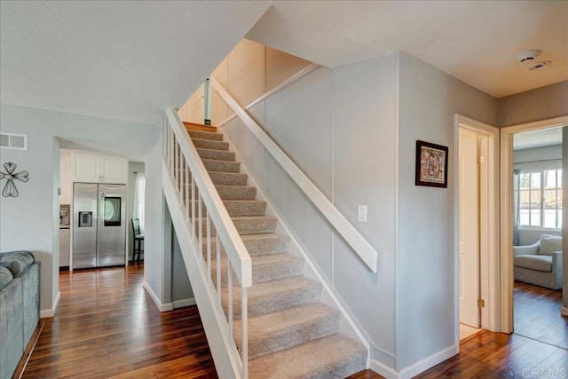 24920 Via Lopez Ct, Ramona, CA 92065 - stairs with wood finished floors and baseboards