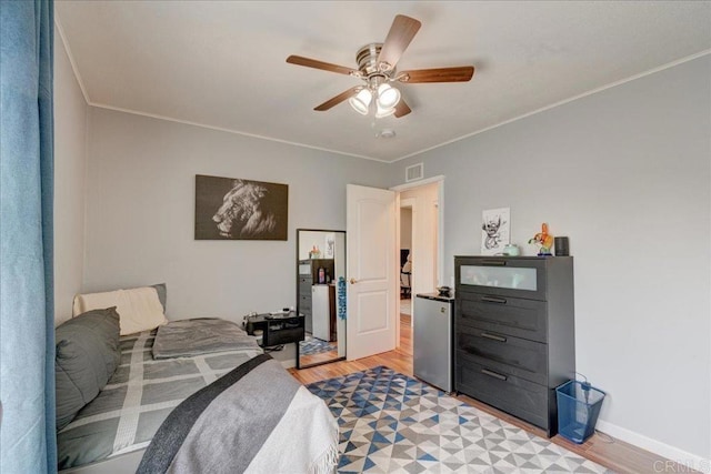 24920 Via Lopez Ct, Ramona, CA 92065 - bedroom with light wood-style flooring, ceiling fan, and ornamental molding