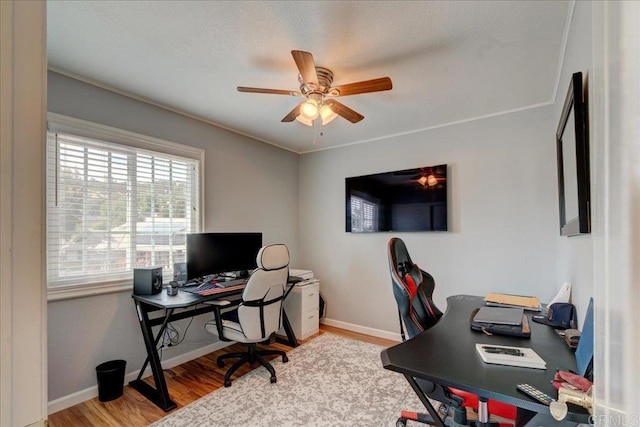 24920 Via Lopez Ct, Ramona, CA 92065 - office area featuring wood finished floors, ceiling fan, and baseboards