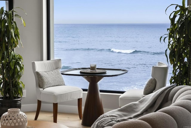 5067 Shore Dr, Carlsbad, CA 92008 - dining space with a water view and wood finished floors