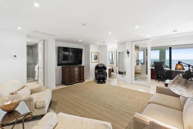 5067 Shore Dr, Carlsbad, CA 92008 - living area with recessed lighting and light tile patterned floors