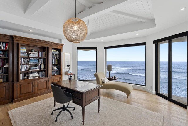 5067 Shore Dr, Carlsbad, CA 92008 - home office featuring beam ceiling, light wood-type flooring, recessed lighting, and a water view