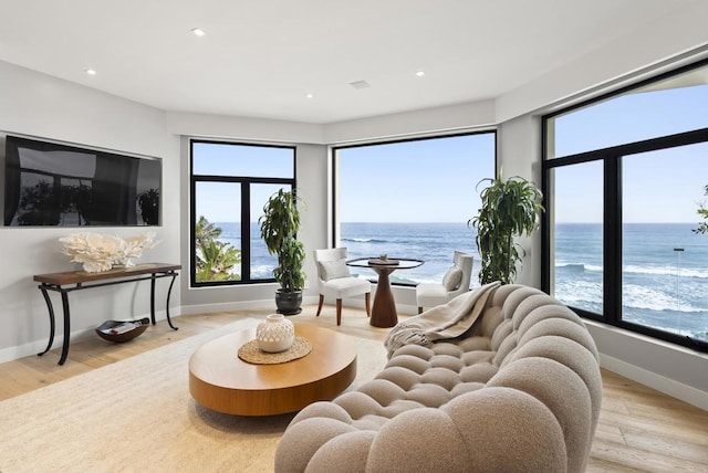 5067 Shore Dr, Carlsbad, CA 92008 - living area featuring wood finished floors, a water view, and recessed lighting