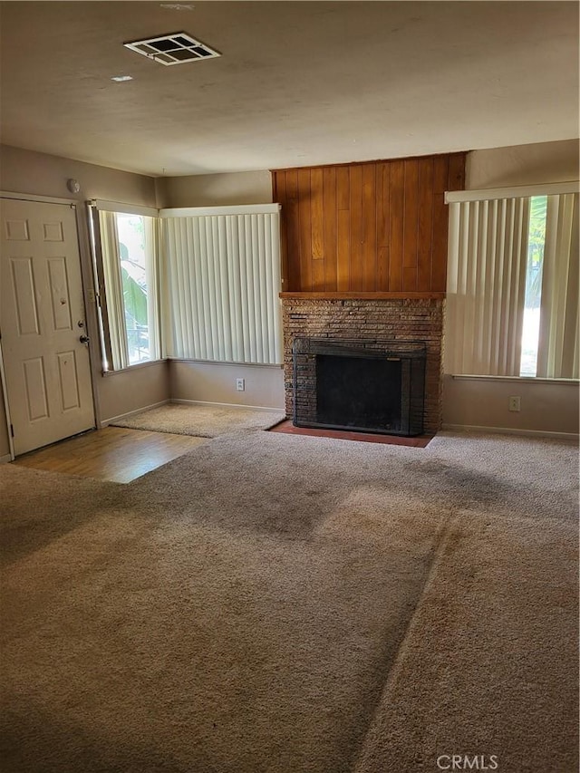 253 S Franklin St, Hemet, CA 92543 - unfurnished living room featuring a fireplace with flush hearth, carpet, and baseboards