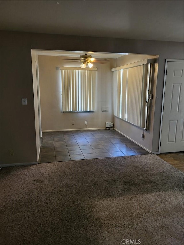 253 S Franklin St, Hemet, CA 92543 - unfurnished room with tile patterned flooring, baseboards, ceiling fan, and carpet flooring