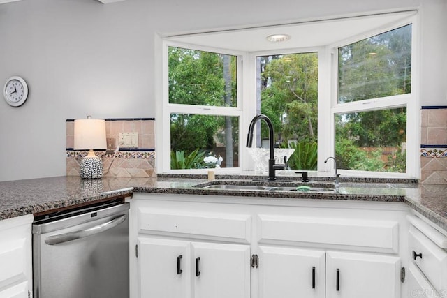 1093 Rancho Santa Fe Rd, Encinitas, CA 92024 - kitchen featuring stainless steel dishwasher, a sink, backsplash, and dark stone counters