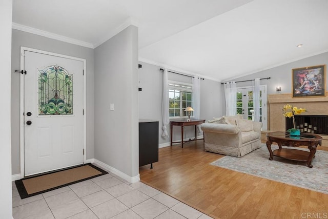 1093 Rancho Santa Fe Rd, Encinitas, CA 92024 - foyer entrance with ornamental molding, baseboards, light wood-style floors, french doors, and vaulted ceiling