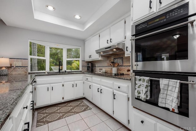 1093 Rancho Santa Fe Rd, Encinitas, CA 92024 - kitchen with stainless steel double oven, a sink, black electric stovetop, backsplash, and recessed lighting