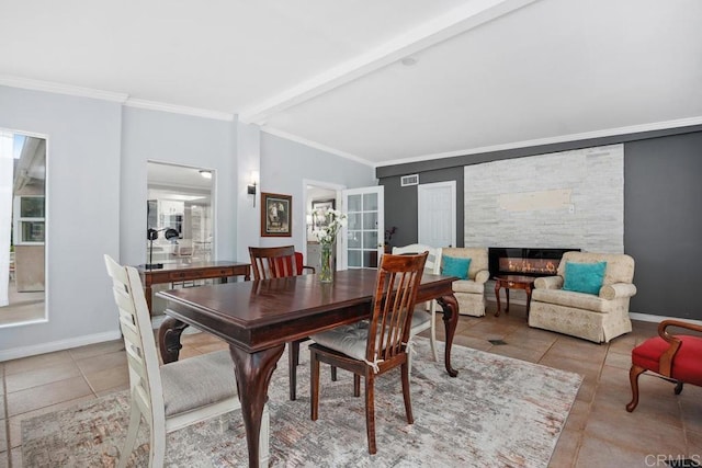 1093 Rancho Santa Fe Rd, Encinitas, CA 92024 - dining room with tile patterned flooring, ornamental molding, baseboards, beam ceiling, and a stone fireplace