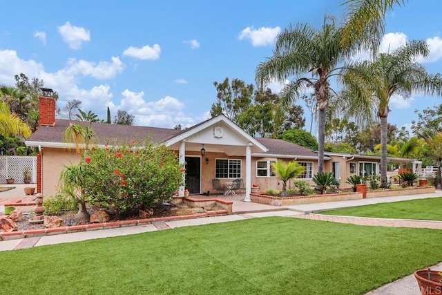 1093 Rancho Santa Fe Rd, Encinitas, CA 92024 - ranch-style house with a chimney, a front yard, covered porch, and stucco siding