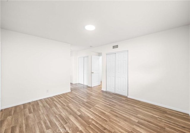 17435 Lassen St, Northridge, CA 91325 - spare room featuring light wood-style flooring and baseboards