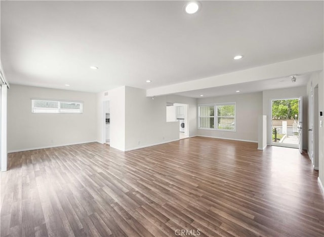 17435 Lassen St, Northridge, CA 91325 - unfurnished living room featuring recessed lighting, wood finished floors, baseboards, and washer / clothes dryer