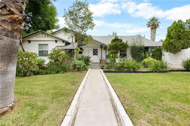 17435 Lassen St, Northridge, CA 91325 - view of front of home featuring a front yard and board and batten siding
