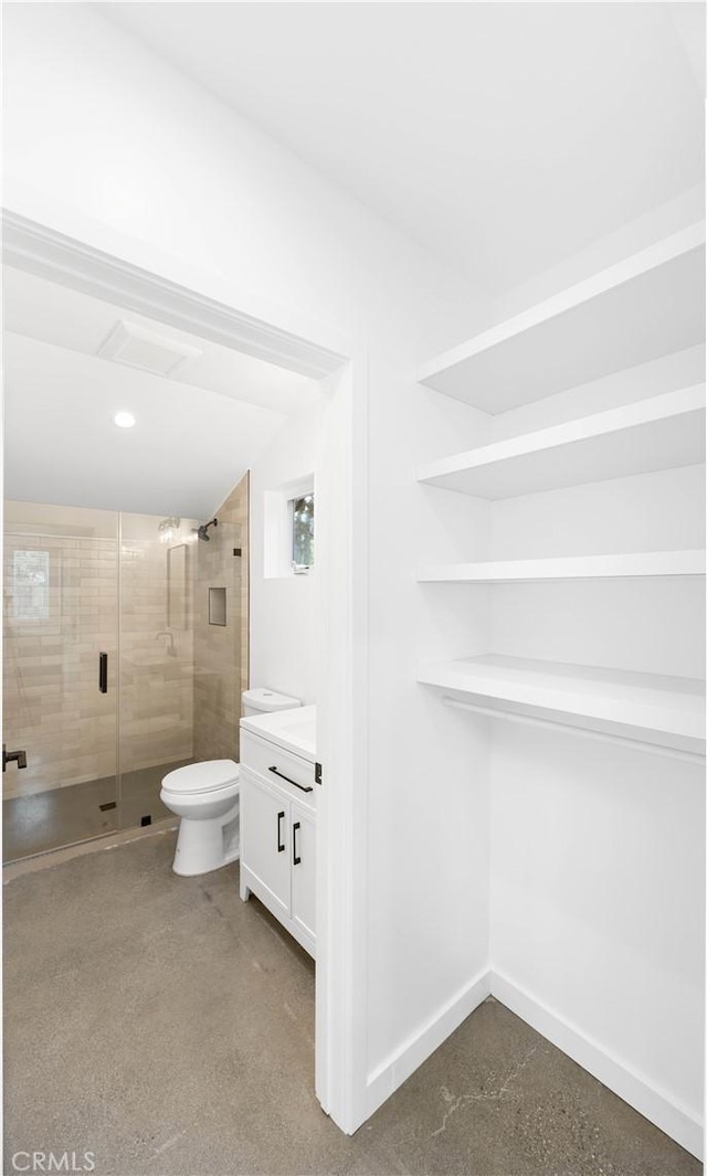 17435 Lassen St, Northridge, CA 91325 - bathroom with vanity, a shower stall, toilet, baseboards, and recessed lighting