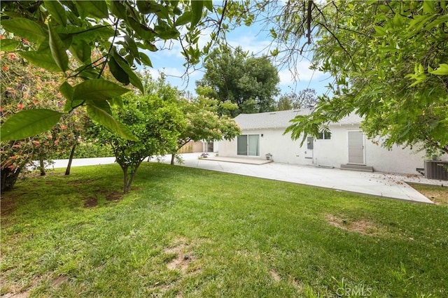 17435 Lassen St, Northridge, CA 91325 - view of green lawn with a patio and central AC