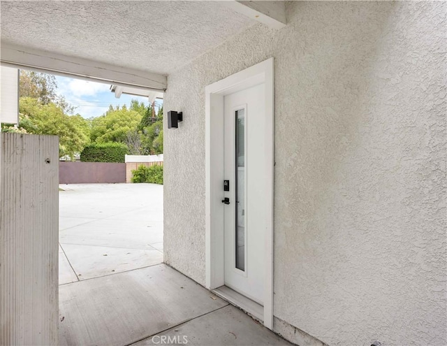 17435 Lassen St, Northridge, CA 91325 - entrance to property featuring stucco siding and a patio