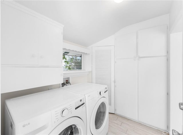 17435 Lassen St, Northridge, CA 91325 - laundry room with cabinet space, independent washer and dryer, and light wood-style flooring