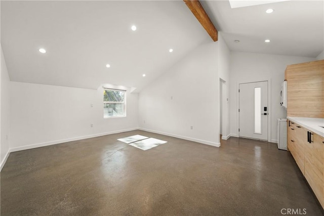 17435 Lassen St, Northridge, CA 91325 - unfurnished living room with finished concrete flooring, baseboards, and recessed lighting