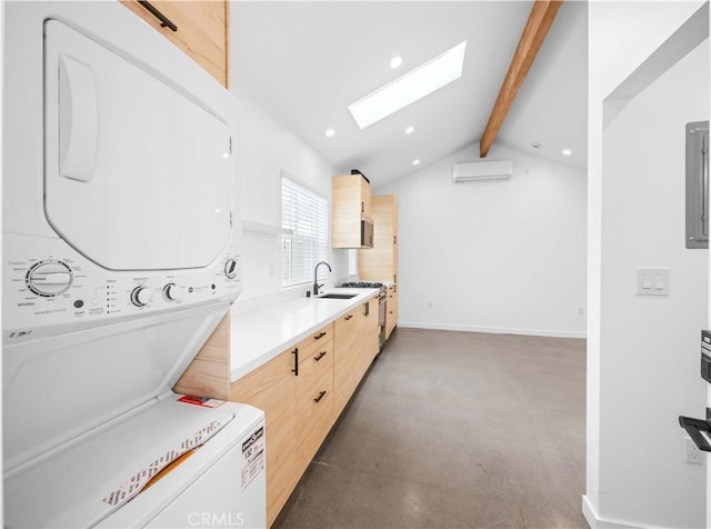 17435 Lassen St, Northridge, CA 91325 - laundry area featuring a skylight, a wall unit AC, stacked washer / drying machine, recessed lighting, and baseboards