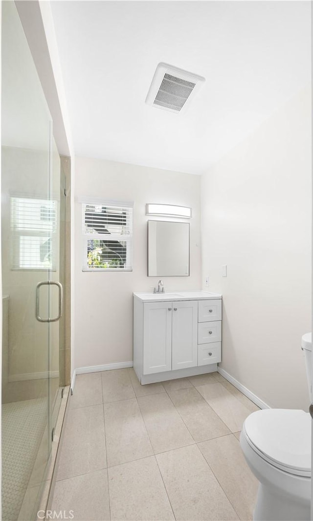 17435 Lassen St, Northridge, CA 91325 - bathroom with vanity, baseboards, toilet, and a stall shower