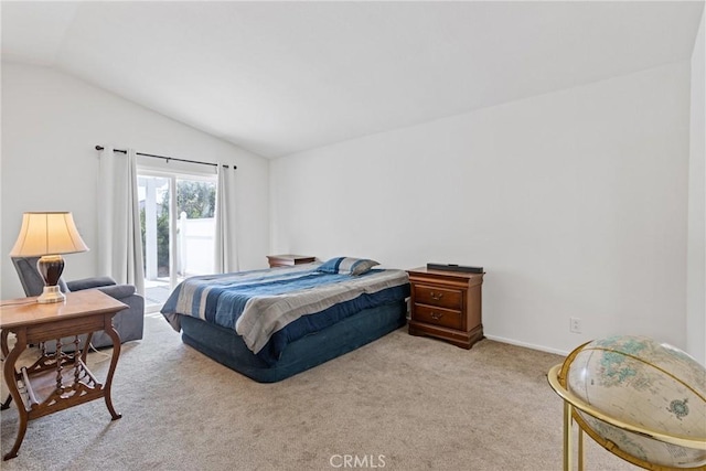 40612 Via Amapola, Murrieta, CA 92562 - bedroom with lofted ceiling, access to exterior, light colored carpet, and baseboards