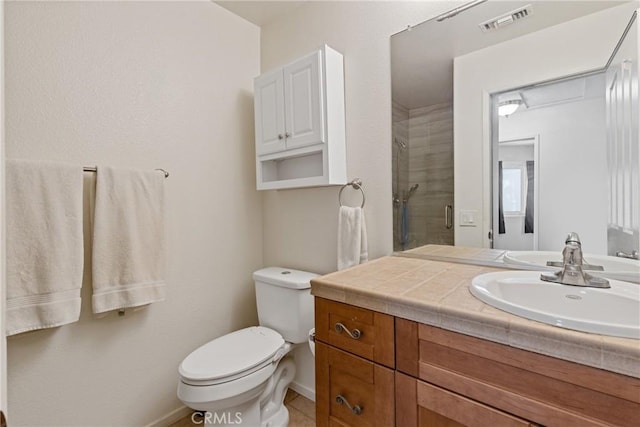 40612 Via Amapola, Murrieta, CA 92562 - full bathroom with vanity, toilet, a tile shower, and baseboards