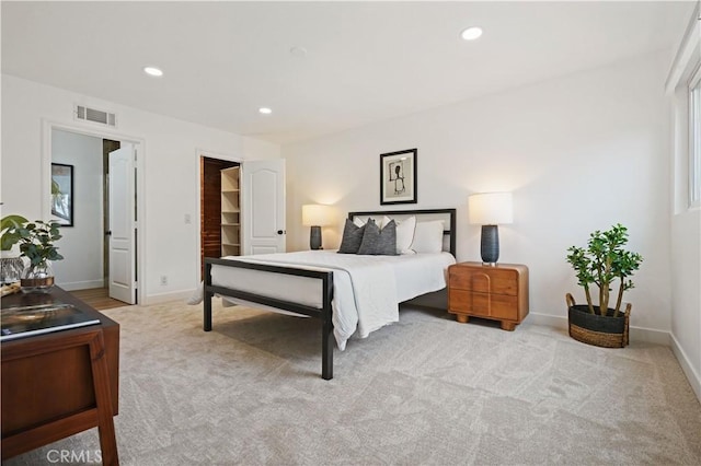 64 Sandpiper Unit 28, Irvine, CA 92604 - bedroom featuring carpet flooring, baseboards, recessed lighting, and a spacious closet