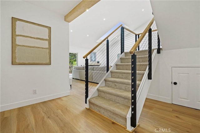 64 Sandpiper Unit 28, Irvine, CA 92604 - stairway with baseboards and wood finished floors