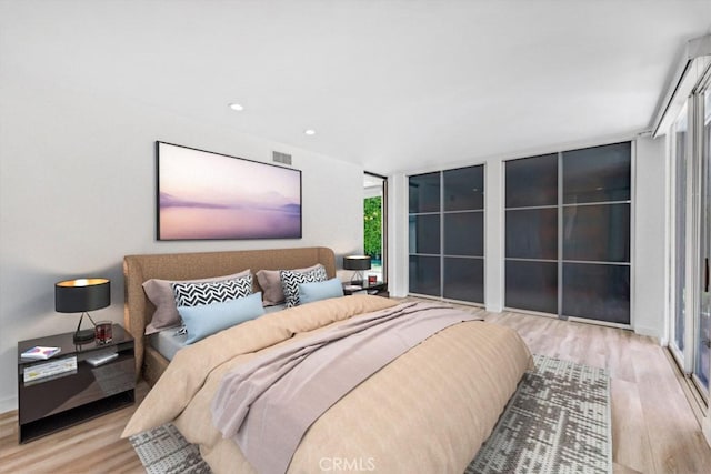 11230 Dilling St, Studio City, CA 91602 - bedroom featuring wood finished floors and recessed lighting