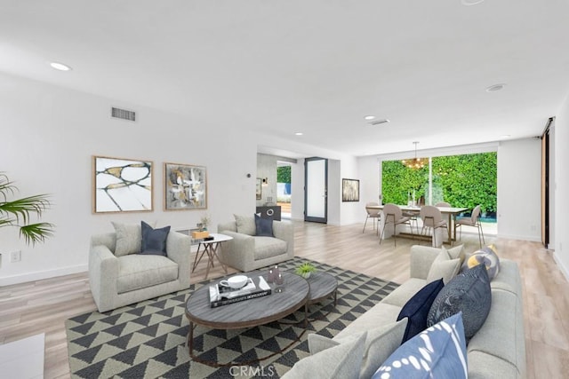 11230 Dilling St, Studio City, CA 91602 - living room featuring wood finished floors, baseboards, and recessed lighting