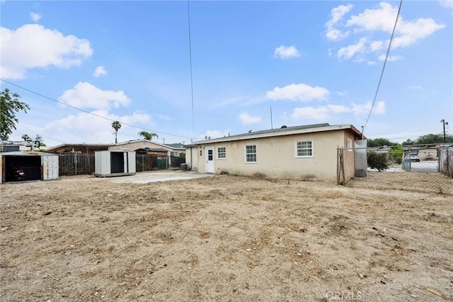 820 Carlotta Ct, Redlands, CA 92374 - rear view of house featuring stucco siding