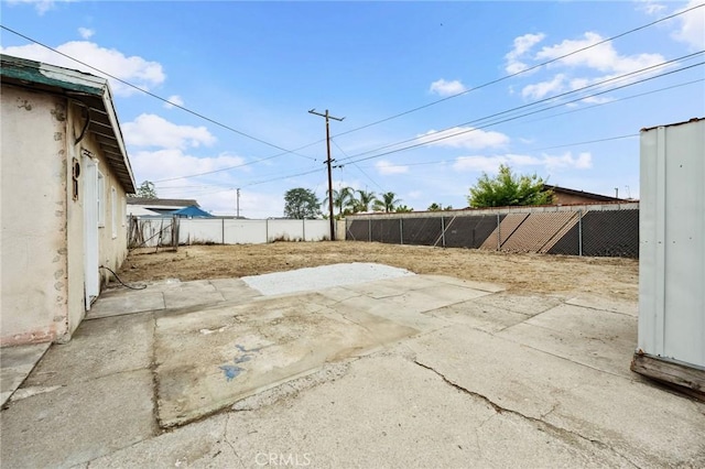 820 Carlotta Ct, Redlands, CA 92374 - fenced backyard with a patio