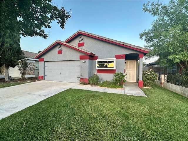 618 Award Dr, Colton, CA 92324 - view of front of property with stucco siding, concrete driveway, and an attached garage