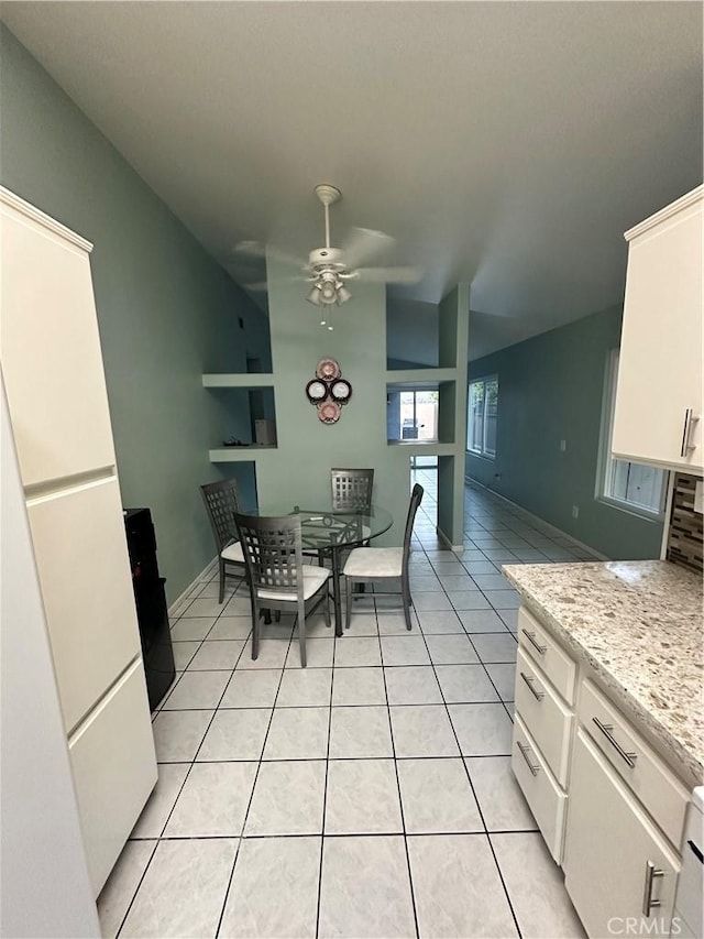 618 Award Dr, Colton, CA 92324 - dining space with a ceiling fan, light tile patterned flooring, lofted ceiling, and baseboards