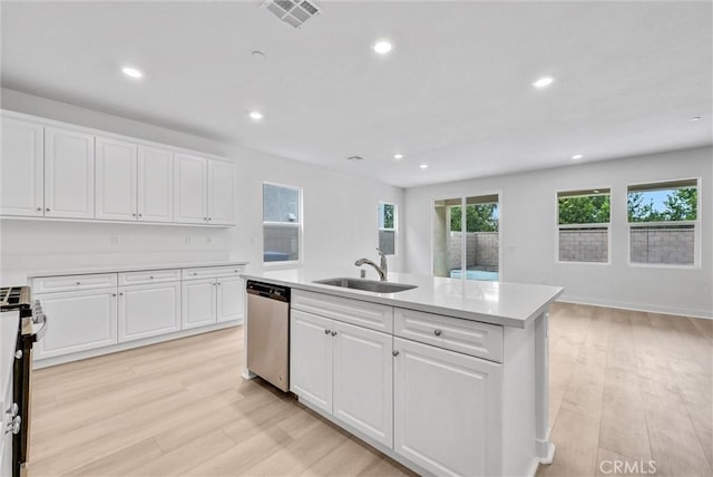 4742 S Scott Way, Ontario, CA 91762 - kitchen featuring appliances with stainless steel finishes, light countertops, white cabinetry, recessed lighting, and light wood-type flooring