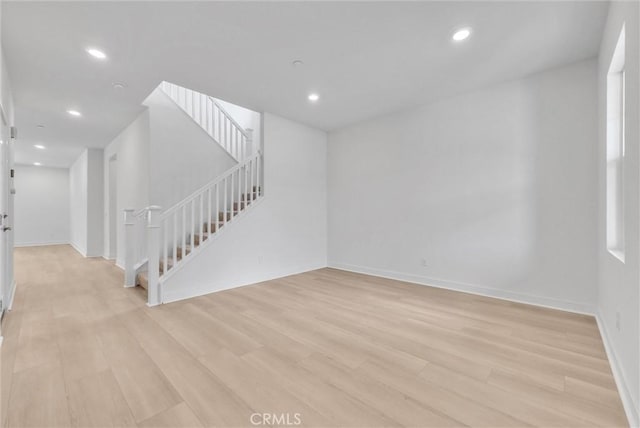 4742 S Scott Way, Ontario, CA 91762 - unfurnished living room featuring light wood-style flooring, recessed lighting, and stairway