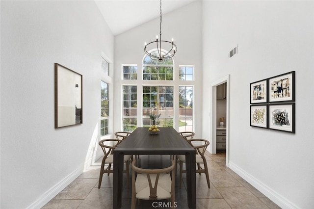 30667 Shore Ridge Dr, Menifee, CA 92584 - dining space featuring a chandelier, baseboards, plenty of natural light, high vaulted ceiling, and light tile patterned flooring