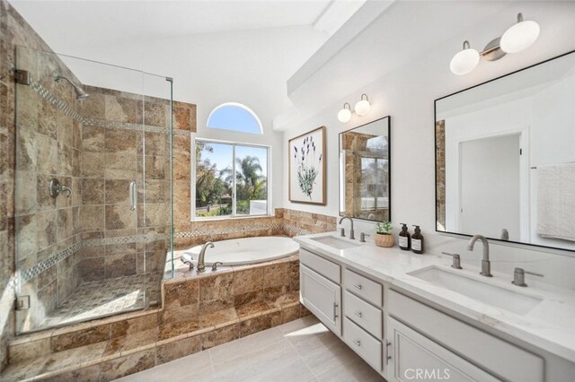30667 Shore Ridge Dr, Menifee, CA 92584 - full bathroom featuring a garden tub, a stall shower, double vanity, tile patterned flooring, and vaulted ceiling