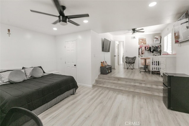 1222 W Kettering St, Lancaster, CA 93534 - bedroom with light wood-type flooring, recessed lighting, and ceiling fan