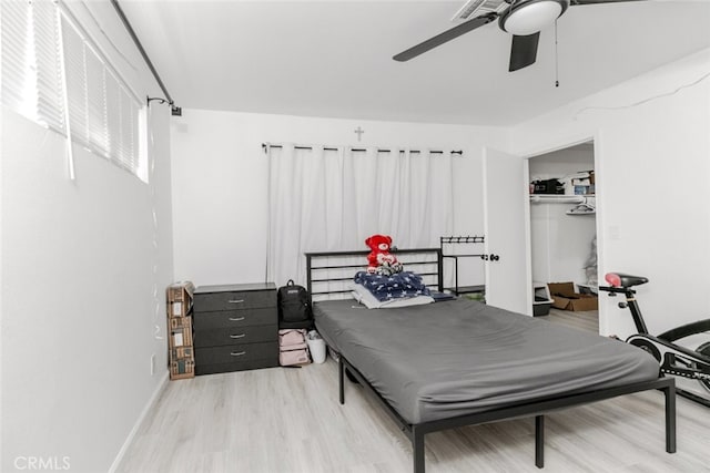 1222 W Kettering St, Lancaster, CA 93534 - bedroom featuring light wood-style flooring, ceiling fan, and a closet