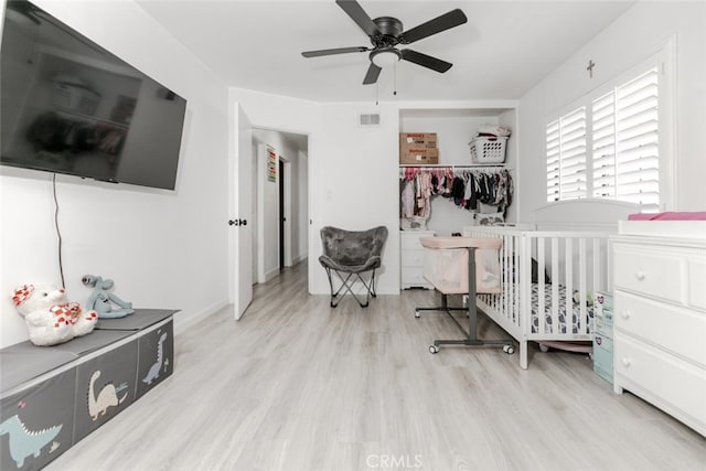 1222 W Kettering St, Lancaster, CA 93534 - bedroom with wood finished floors, a closet, and ceiling fan