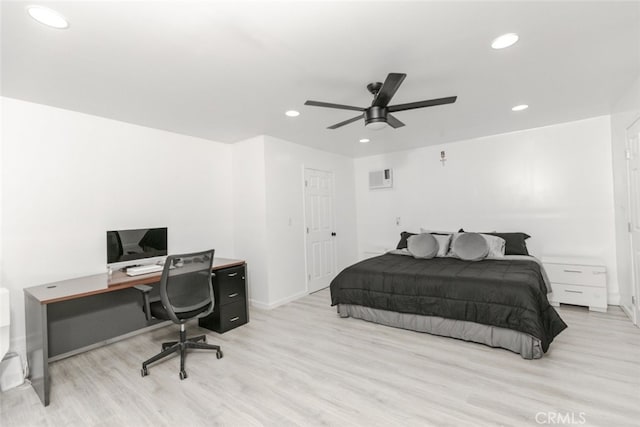 1222 W Kettering St, Lancaster, CA 93534 - bedroom with light wood-style flooring, recessed lighting, an office area, a ceiling fan, and an AC wall unit