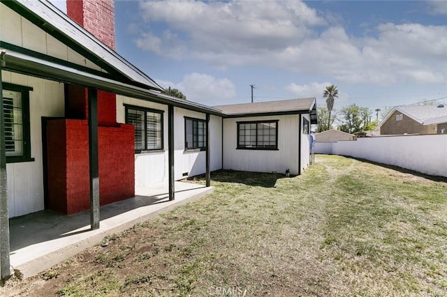 1222 W Kettering St, Lancaster, CA 93534 - back of property with a chimney