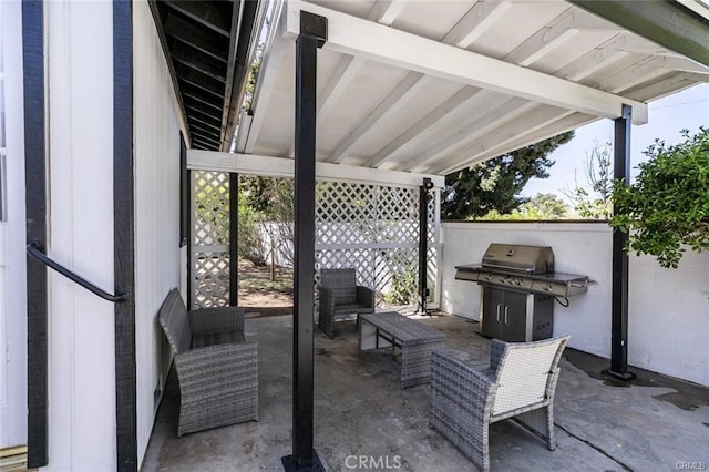 1222 W Kettering St, Lancaster, CA 93534 - view of patio featuring a grill